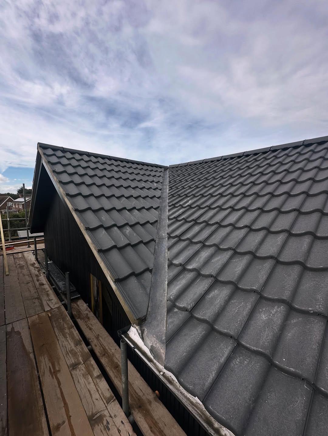 Re - Roof completed in Oulton Broad using new double crest anthracite grey tiles 🔥🧨